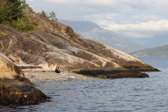 Filmstill performance "Havets Kraft" in Hardangerfjord during the residency at Kh Messen, Alvik, Norway in the late summer of 2023